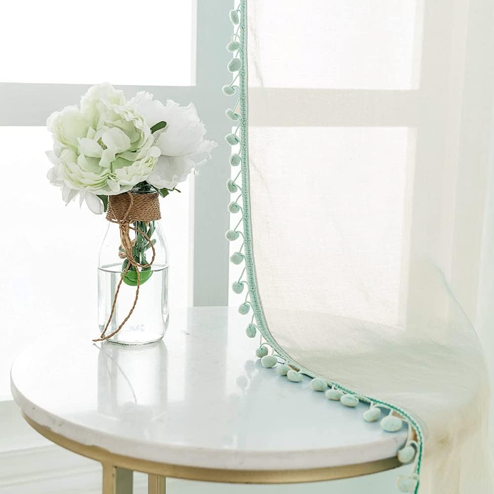 Transform Your Space with Mint Green Sheer Curtains Featuring Stylish Pom Poms